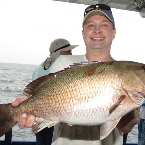 Dr Tony Holowko from Michigain showing off a big mangrove snapper from the 39 hour at Hubbard's Marina
