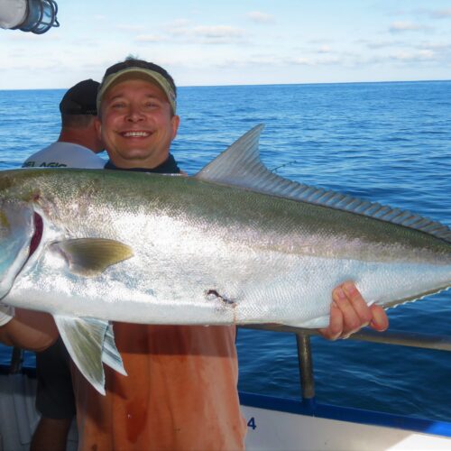 Dr Tony Holowko from Michigan showing off a big amberjack from the 39 hour long range overnight fishing trip at Hubbard's Marina